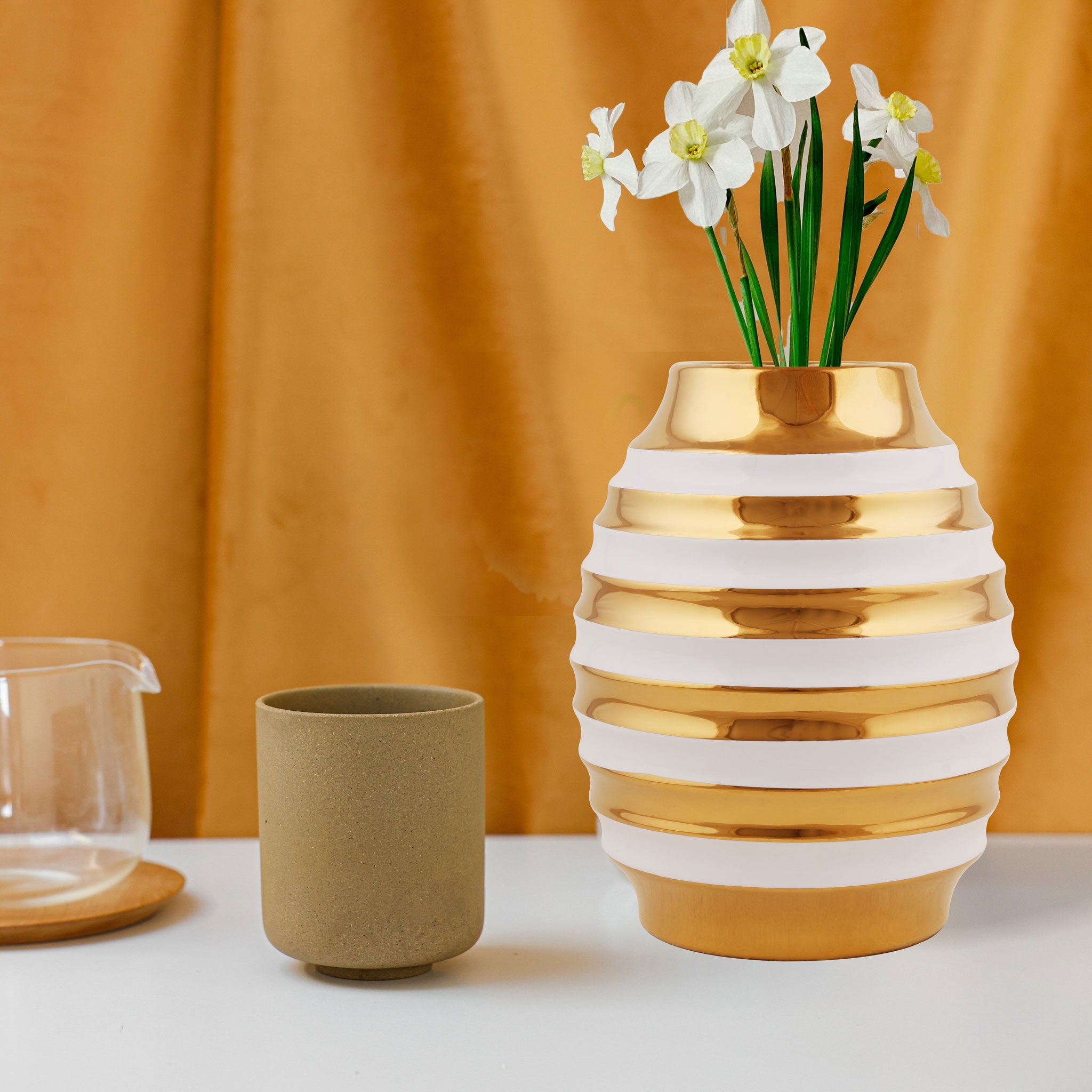 White Porcelain Vase With A Golden Ring Accent