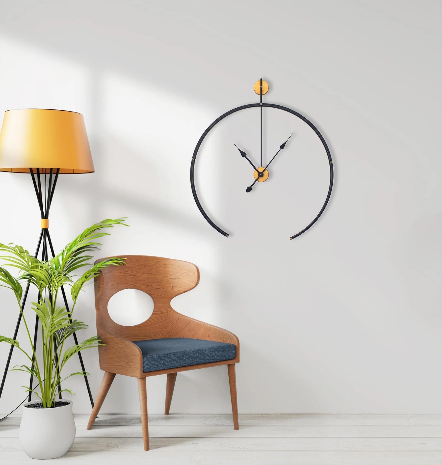 Black Metal Analog Wall Clock With Golden Centre Adding Modern Elegance