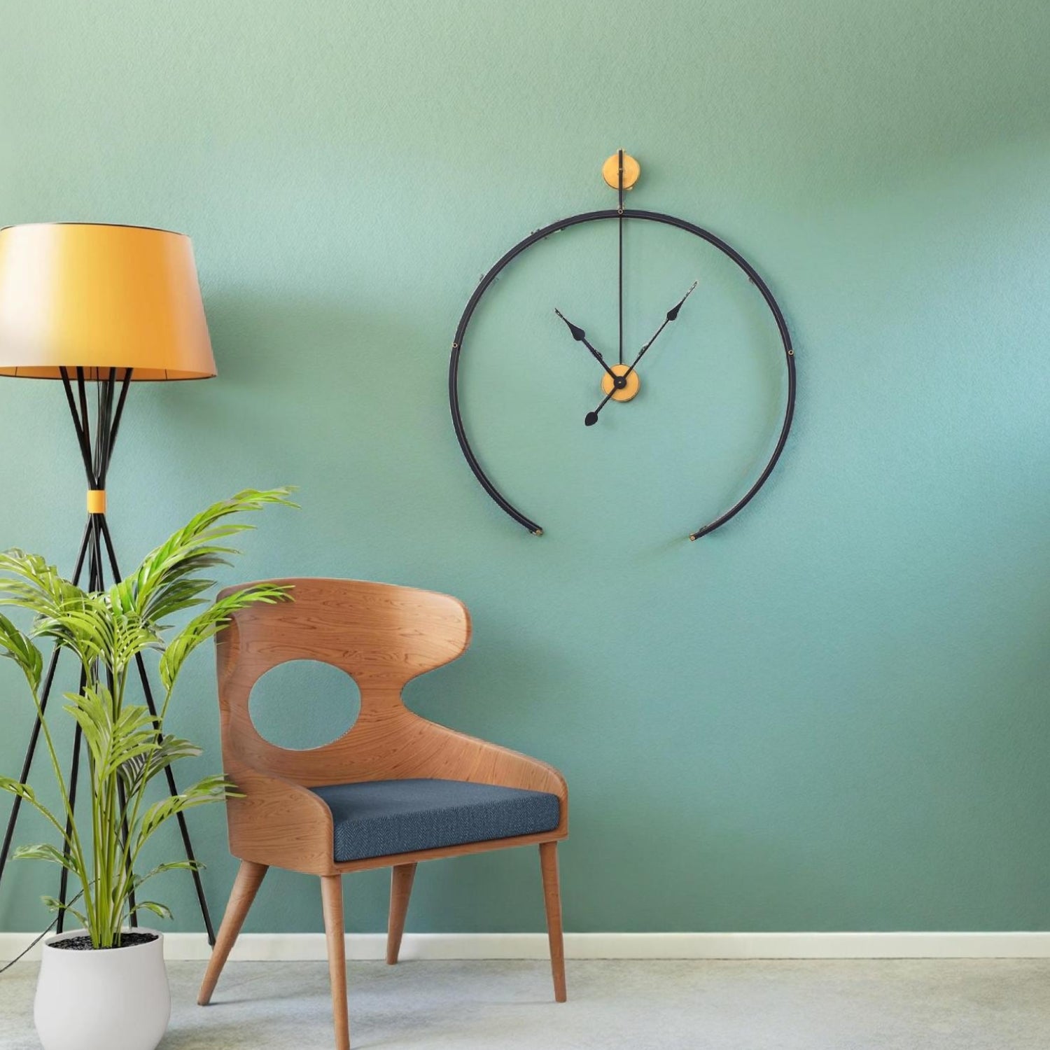 Black Metal Analog Wall Clock With Golden Centre Adding Modern Elegance