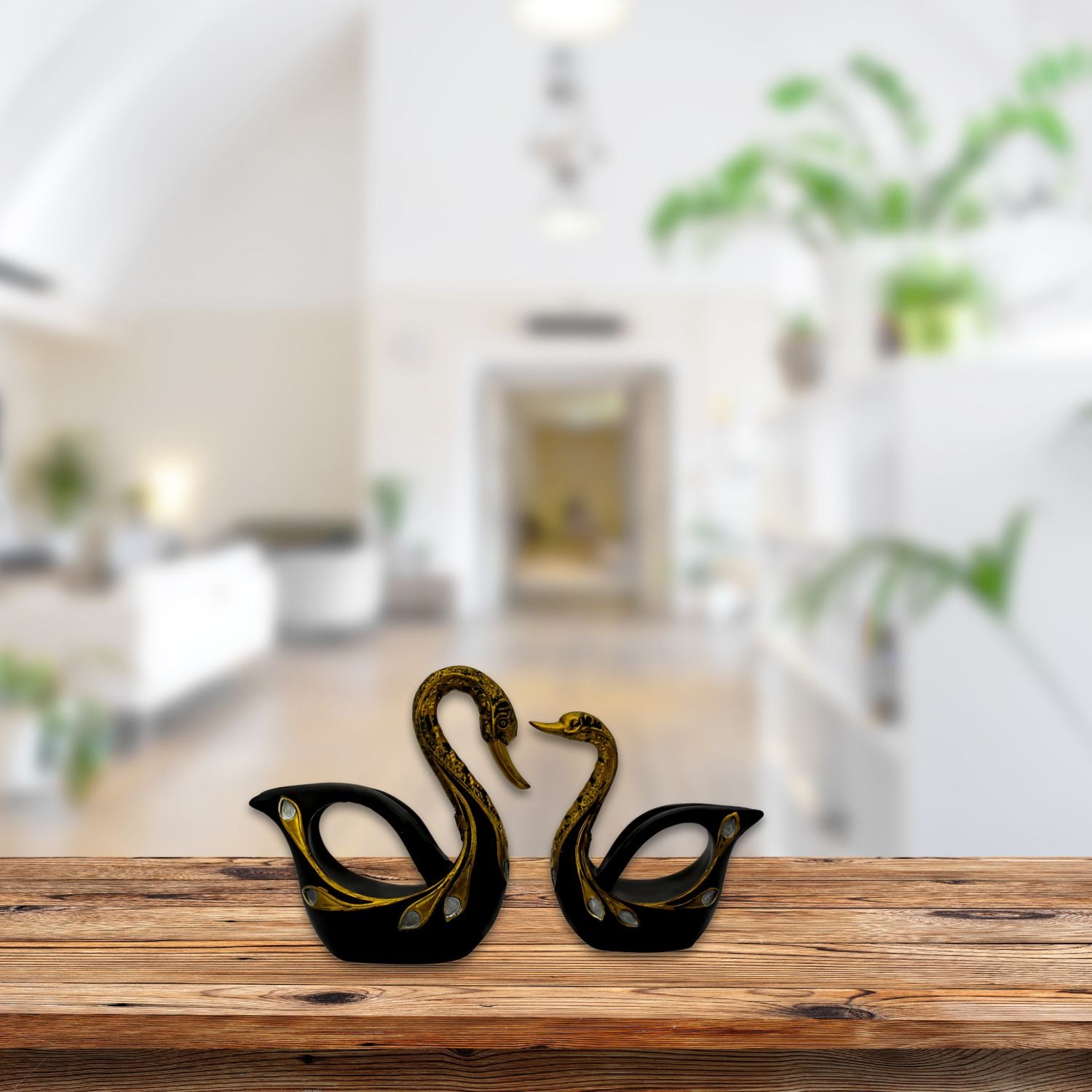 Elegant Black Swan Pair With Gold Detailing For Luxurious Decor