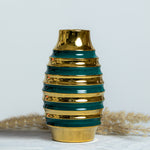 White Porcelain Vase With A Golden Ring Accent
